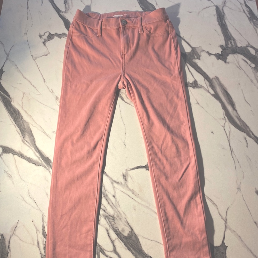 These are are pair of dusty pink jeggings from Old Navy. They are a kids 16.